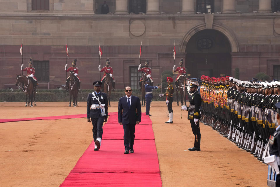 Egyptian President Abdel Fattah El-Sisi inspects a joint military guard of honour during his ceremonial reception at the Indian presidential palace, in New Delhi, India, Wednesday, Jan. 25, 2023. El-Sisi will be the Chief Guest on the country's annual Republic Day parade on Thursday. (AP Photo/Manish Swarup)