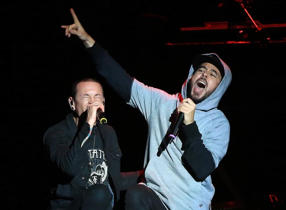 Chester Bennington and Mike Shinoda of Linkin Park perform onstage in 2015 (Getty Images)