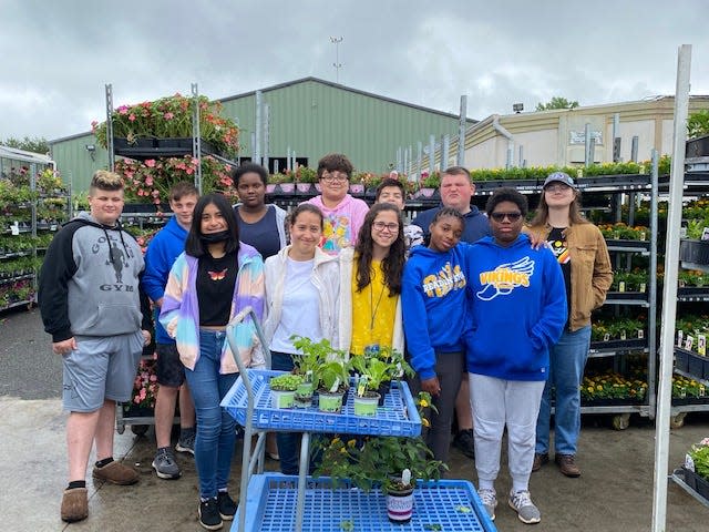 (Left to right): Carmine Colantuono, Wyatt Hughes, Kelly Nieto Cervantes, Tanya McNeil, Anna Rutgers, Lily Rutgers, Richard Calderon Duarte, David Salvador, Danielle Wilson, Jason Horner, Arianna Markowitz, and Hionis Greenhouse Employee, Sydney.