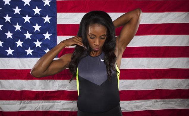 Hurdler Lashinda Demus poses for a portrait during the 2012 U.S. Olympic Team Media Summit in Dallas, May 13, 2012.