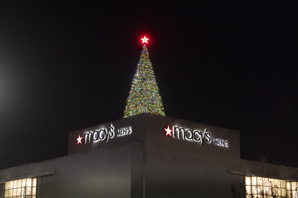 IMAGE DISTRIBUTED FOR MACY'S -  Macy's Atlanta Great Tree is an eco-friendly, reusable tree that stands 56-feet-tall and is adorned with 45,000 multi-color sparkling LED lights that spans more than eight miles draped around the tree. To kick off the holiday season, the Great Tree was lit during a private ceremony on Thursday, Nov. 12, 2020, in Atlanta. (John Amis/AP Images for Macy's, Inc.)