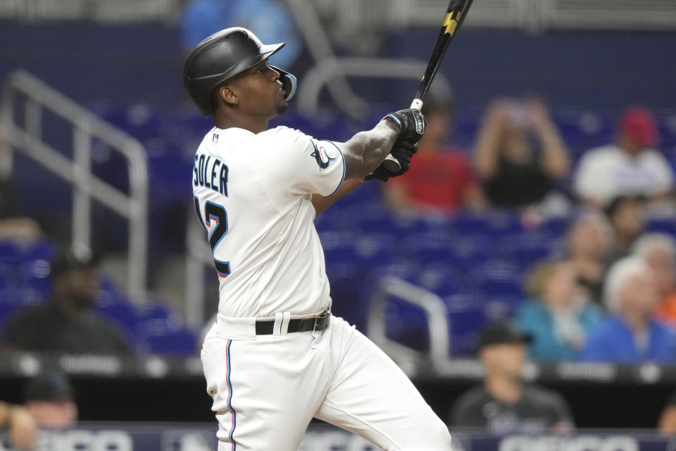 Miami Marlins' Jorge Soler follow through on a two-run home run during the seventh inning of a baseball game against the San Francisco Giants, Monday, April 17, 2023, in Miami. (AP Photo/Lynne Sladky)