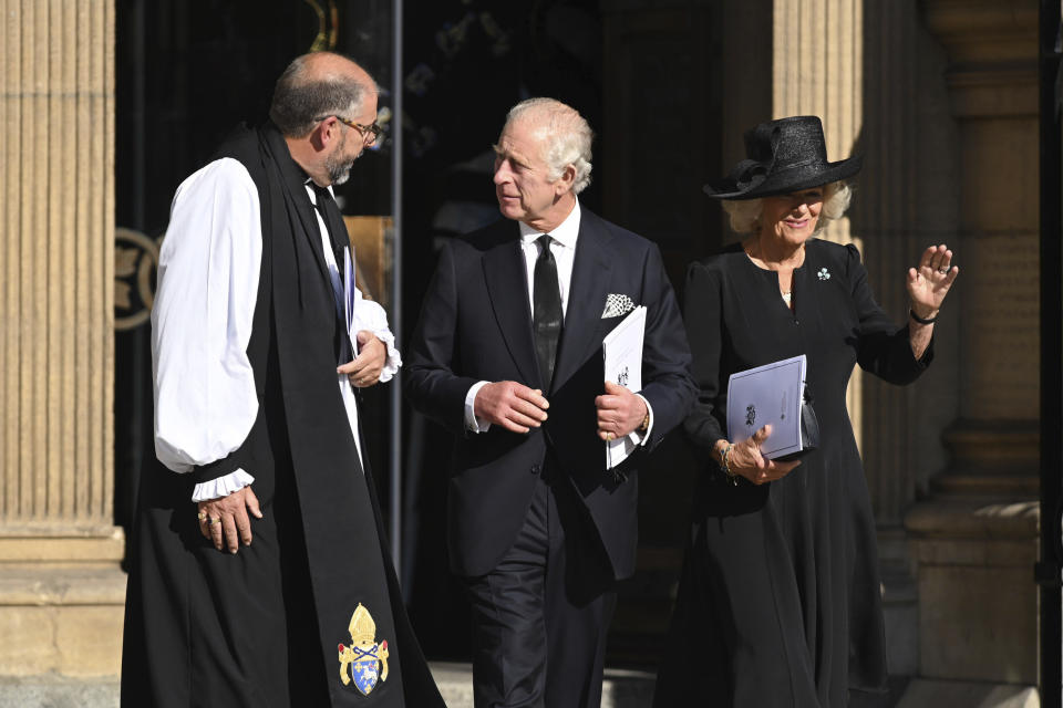 King Charles III and Camilla, the Queen Consort leave St Anne's Cathedral in Belfast, Tuesday, Sept. 13, 2022, during their visit to Northern Ireland. (Michael Cooper/PA via AP)