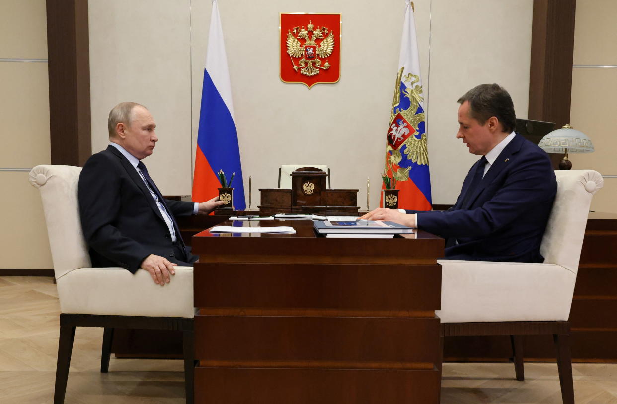 Russian President Vladimir Putin meets with the Belgorod region's governor, Vyacheslav Gladkov, outside Moscow in January.