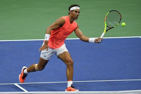 Nadal survives Russian threat advance Open