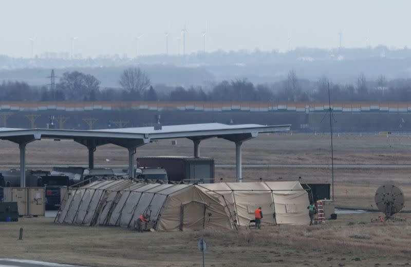 Military personnel work as part of the preparations of the arrival of U.S. troops at Rzeszow-Jasionka Airport