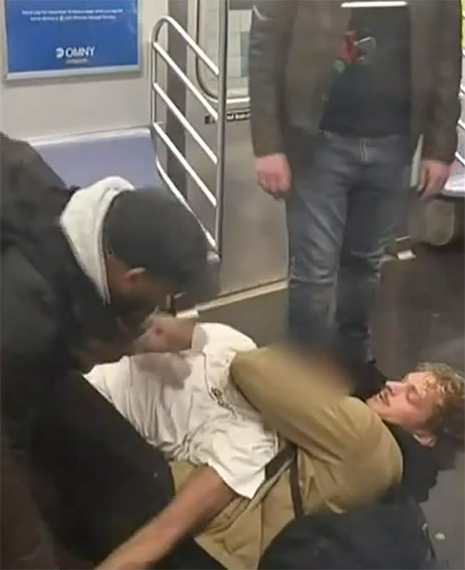 A 30-year-old man died aboard a Manhattan subway train Monday following an altercation that began with him threatening other passengers, according to investigators, and ended with him being put into a chokehold. (Juan Alberto Vazquez)