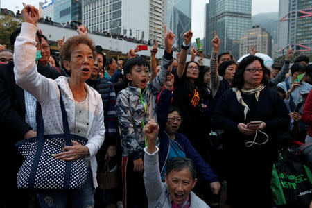 Supporters of Chief Executive candidate and former Financial Secretary John Tsang shout during a campaign rally in Hong Kong, China March 24, 2017. REUTERS/Tyrone Siu