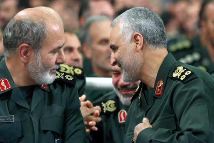 Ali Akbar Ahmadian (L) speaking with slain IRGC General Qasem Soleimani in Tehran