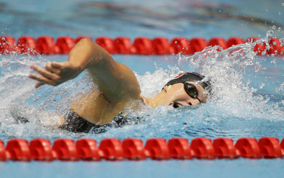 FILE - In this June 27, 2017, file photo, Katie Ledecky swims on her way to winning the women's 800-meter freestyle at the U.S. swimming championships in Indianapolis. At two years to the day the Tokyo Olympics open, Katie Ledecky is swimming as fast as ever, Caeleb Dressel is being heralded as a potential Phelps, and Missy Franklin is attempting a comeback. And Ryan Lochte is newly banned again. (AP Photo/Michael Conroy, File)