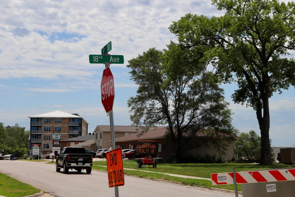 A digital signs warns of closures of the 5th Street and 18th Avenue intersection beginning July 8, part of the next phase of the 5th Street Improvement project, seen on Wednesday, June 26, 2024, in Coralville, Iowa.