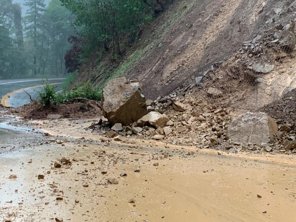 On Friday, Dec. 30, 2022, this photo from Caltrans District 1 shows State Route 271 closed south of Piercy due to an active slide near the McCoy Creek Bridge in Mendocino County, Calif.  Californians on Friday were bracing for heavy downpours and potential flooding from a series of rainstorms poised to usher in the new year.