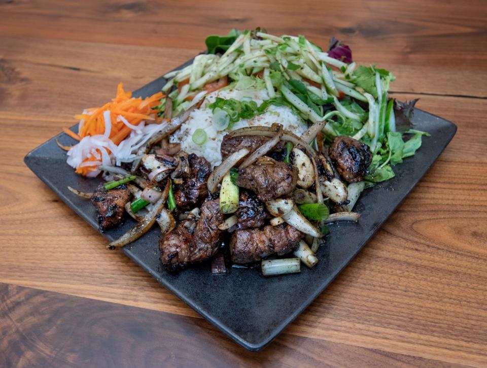 A shaken ribeye plate is ready to eat Friday at the new Basil & Sprout Vietnamese Kitchen restaurant in Pensacola.