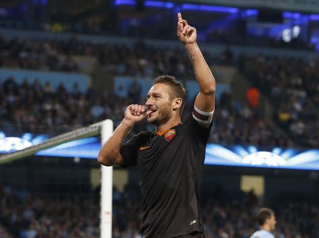AS Roma's Francesco Totti celebrates scoring a goal against Manchester City during their Champions League soccer match at the Etihad Stadium in Manchester, northern England, September 30, 2014. REUTERS/Phil Noble
