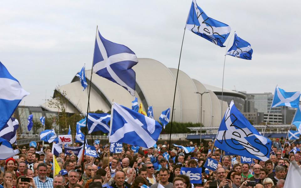 'Yes' campaign people gather for a rally outside the BBC in Glasgow - Credit: REUTERS/Paul Hackett