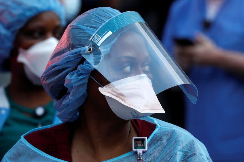 NYPD police thank healthcare workers at NYU Langone Medical Center during outbreak of coronavirus disease (COVID-19) in New York