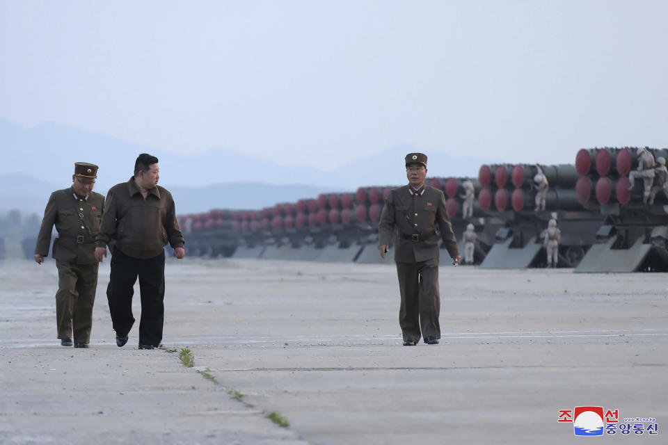 In this undated photo provided on Friday, May 31, 2024 by the North Korean government, North Korean leader Kim Jong Un, second left, supervises firing drills at an undisclosed place in North Korea. Independent journalists were not given access to cover the event depicted in this image distributed by the North Korean government. The content of this image is as provided and cannot be independently verified. Korean language watermark on image as provided by source reads: "KCNA" which is the abbreviation for Korean Central News Agency. (Korean Central News Agency/Korea News Service via AP)