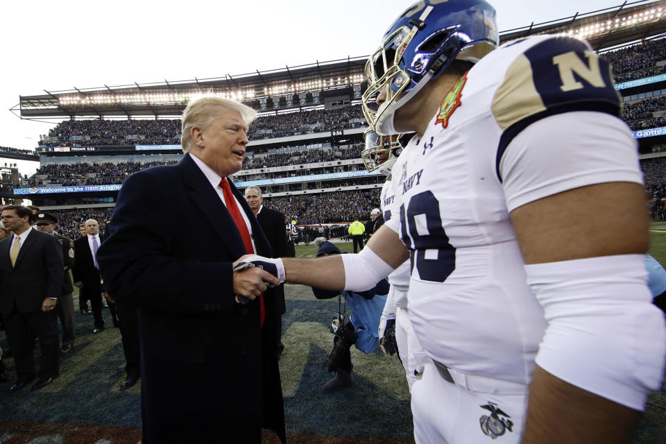 President Donald Trump meets with Navy player Anthony Gargiulo ahead of the Army-Navy game on Dec. 8 in Philadelphia. (AP Photo/Matt Rourke)