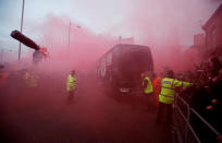 <p>Soccer Football – Champions League Quarter Final First Leg – Liverpool vs Manchester City – Anfield, Liverpool, Britain – April 4, 2018 Liverpool fans set off flares and throw missiles at the Manchester City team bus outside the stadium before the match Action Images via Reuters/Carl Recine TPX IMAGES OF THE DAY </p>