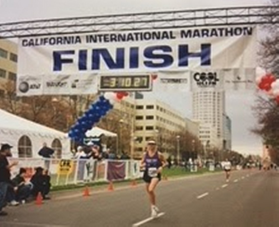 Karen Johnson approaches the finish line of the California International Marathon. Johnson, a Placer County sheriff&#x002019;s deputy and elite runner, died in January 2003 when she was struck by a vehicle while running in Orangevale. She will be remembered during a Mary 12, 2018, Fun Run in Auburn sponsored by the Placer County Sheriff&#x002019;s Office to raise funds for Northern California Special Olympics athletes.