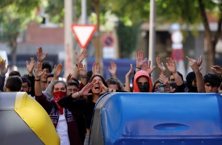 Protesters gather as Ciudadanos party leader Albert Rivera visits the Saudade centre in Barcelona