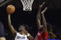 Baylor guard Ja'Kobe Walter goes up to score past Gardner-Webb forward Isaiah Richards, right, in the first half of an NCAA college basketball game, Sunday, Nov. 12, 2023, in Waco, Texas. (AP Photo/Jerry Larson)