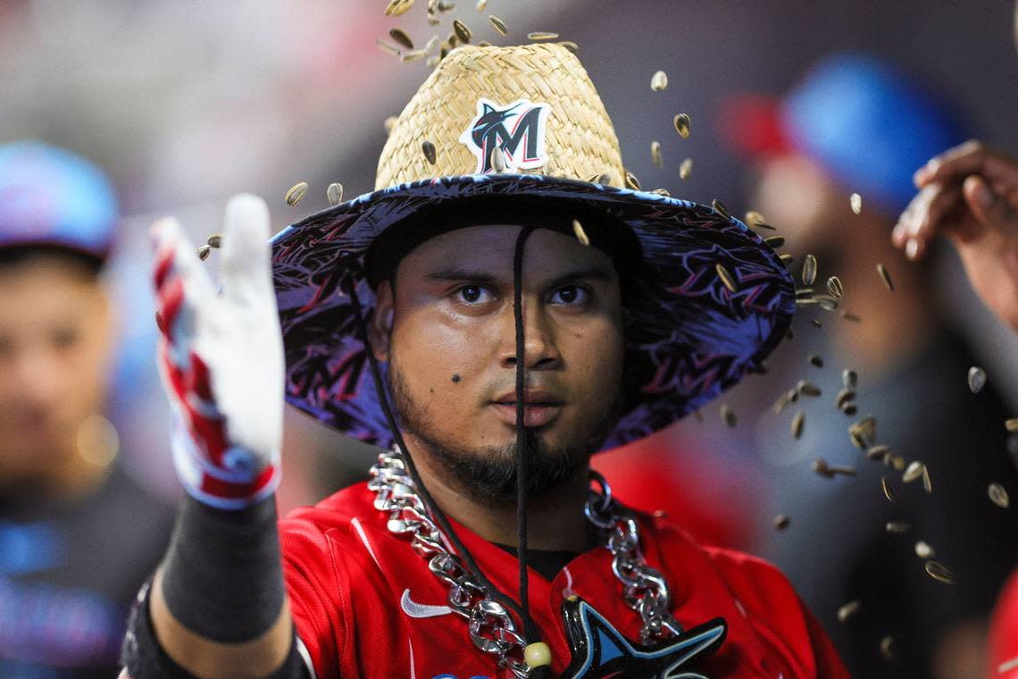 Sep 16, 2023; Miami, Florida, USA; Miami Marlins second baseman Luis Arraez (3) celebrates with teammates after hitting a home run against the Atlanta Braves during the first inning at loanDepot Park. Sam Navarro/USA TODAY Sports