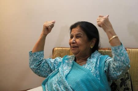 Rehana Khursheed Hashmi, 75, migrated from India with her family in 1960 and whose relatives, live in India, gestures as she speaks with Reuters at her residence in Karachi, Pakistan August 7, 2017. Picture taken August 7, 2017/REUTERS/Akhtar Soomro