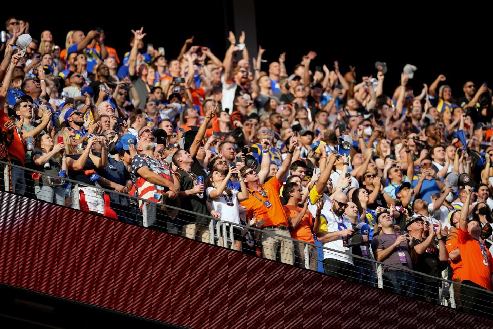 Football fans cheer as Super Bowl 56 is underway Sunday, Feb. 13, 2022, at SoFi Stadium in Inglewood, Calif.