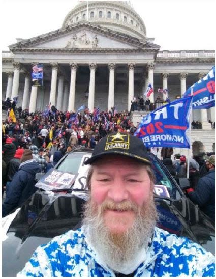 Trump supporter Edward T. Spain Jr. took this photo of himself outside the U.S. Capitol around 2:28 p.m. on Jan. 6, 2021, before illegally going inside, federal prosecutors told a judge in a sentencing memo. The photo was found on Facebook and became part of the evidence against him.