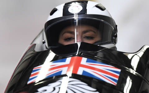 Britain's Mica Mcneill competes in the women's bobsleigh heat 1 run during the Pyeongchang 2018 Winter Olympic Games, at the Olympic Sliding Centre on February 20, 2018 in Pyeongchang  - Credit: MARK RALSTON/AFP
