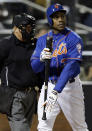 New York Mets' Curtis Granderson reacts after striking out during the sixth inning of a baseball game against the Atlanta Braves, Friday, April 18, 2014, in New York. (AP Photo/Frank Franklin II)