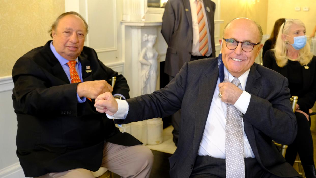 Former New York City Mayor Rudy Giuliani, right, and John Catsimatidis are pictured at the Women's Republican Club in Midtown Manhattan on Sept. 16, 2020. 