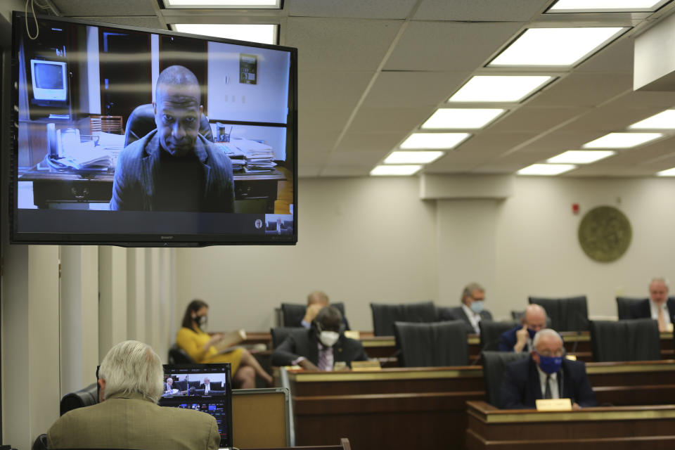 South Carolina Sen. Marlon Kimpson, D-Charleston, watches remotely as the Senate Medical Affairs meets on Thursday, Jan. 21, 2021 in Columbia, S.C. The committee approved a stricter ban on abortions. (AP Photo/Jeffrey Collins)