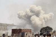 Smoke rises above the Alhva camp, east of the Yemeni capital, Sanaa, on April 17, 2015, following an alleged air strike by the Saudi-led alliance on Huthi rebel camps