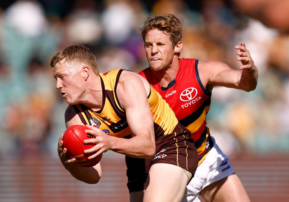 Seen here, Hawthorn's James Sicily being tackled by Adelaide star Rory Sloane during their round six AFL clash.