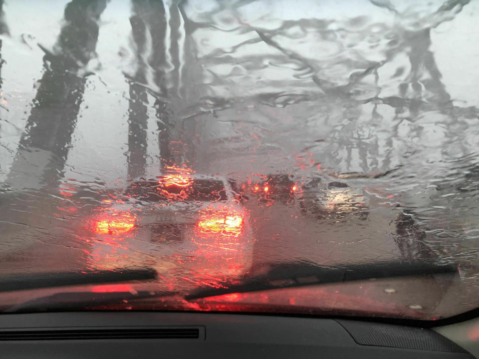 Rain obscures the bridge across the Mississippi River into New Orleans on Wednesday, July 10, 2019. The rain flooded downtown streets and businesses. Gov. John Bel Edwards declared an emergency anead of a tropical weather system considered likely to produce storm surge, hurricane-force winds and up to 15 inches of rain across Louisiana. (AP Photo/Janet McConnaughey)