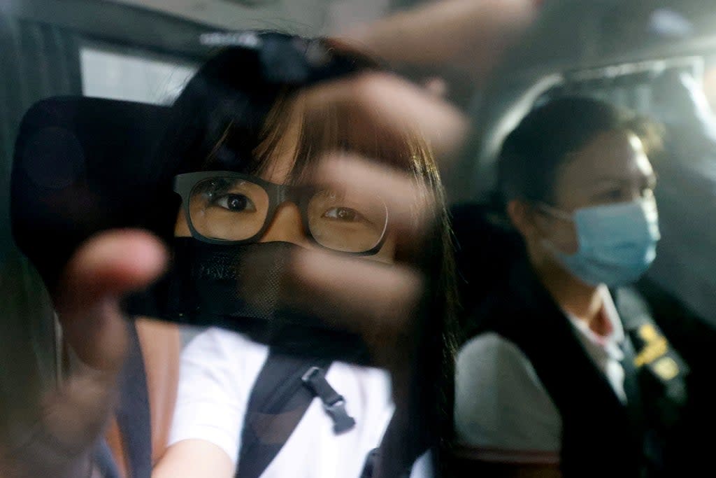 Hong Kong Alliance Vice-Chairwoman Tonyee Chow was seen inside a vehicle after being detained in Hong Kong (REUTERS)