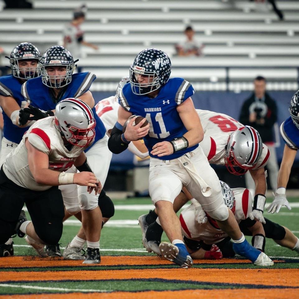 Whitesboro's Kyle Meier runs the football during the 2023 NYSPHSAA State Championships football finals at the JMA Wireless Dome in Syracuse, NY on Saturday, December 2, 2023.