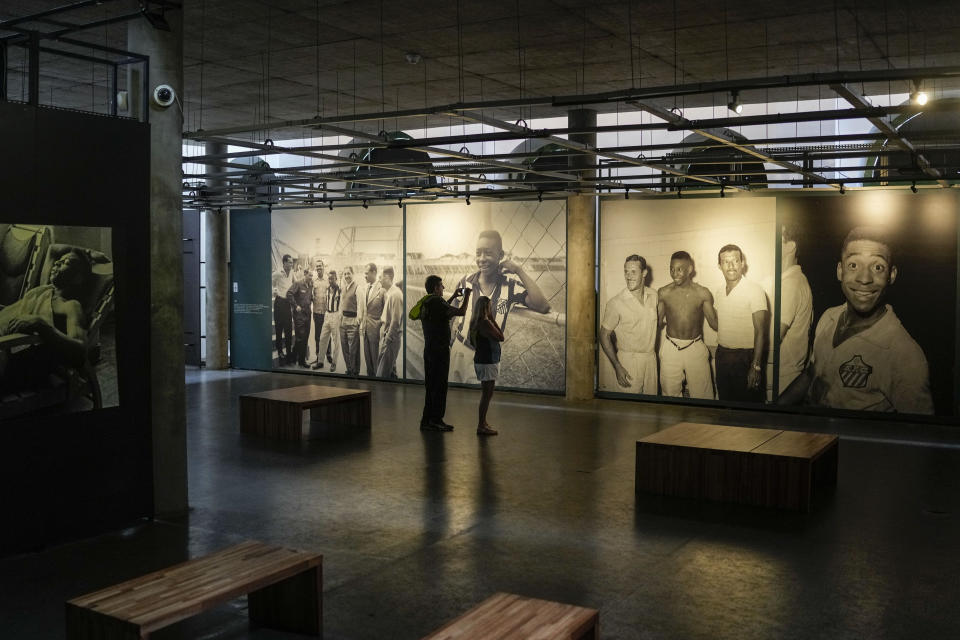 Visitors tour the Pele Museum in Santos, Brazil, Monday, Dec. 26, 2022. (AP Photo/Matias Delacroix)