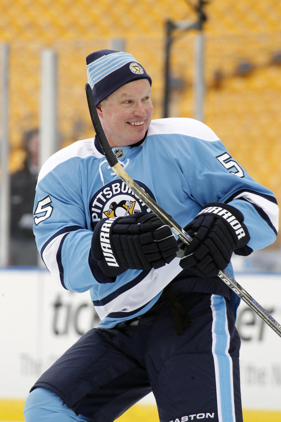 FILE - Pittsburgh Penguins Hall of Fame defenseman Larry Murphy (55) participates in an exhibition hockey game against alumni of the Washington Capitals in Pittsburgh Friday, Dec. 31, 2010. When the NHL implemented 3-on-3 play in overtime nearly a decade ago, the idea was to see the most speed and skill hockey had to offer. In recent years, 3 on 3 has slowed down. Murphy coaches a 3ICE team and believes the NHL should adopt the over-and-back rule. (AP Photo/Gene J. Puskar, File)