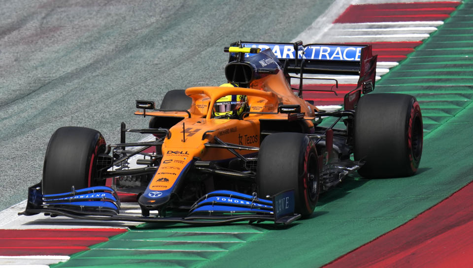 Mclaren driver Lando Norris of Great Britain steers his car during the qualifying session for the F1 Austrian Formula One Grand Prix at the Red Bull Ring circuit in Spielberg, Austria on Saturday July 3, 2021. The Grand Austrian Prize will take place on Sunday.  (AP Photo/Darko Bandic)