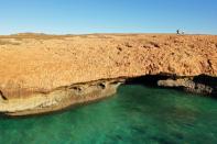 Aerial photo shows team from Deep History of Sea Country surveying Dampier Archipelago in Western Australia