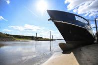 A view of a ship that has run dry at the harbour due to the low water level in the Rhine River in Lobith