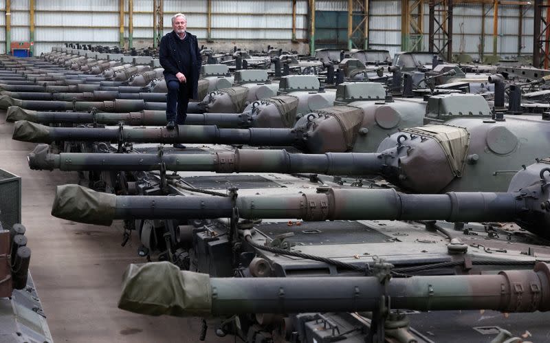 Dozens of German-made Leopard 1 tanks are seen in an hangar in Tournais