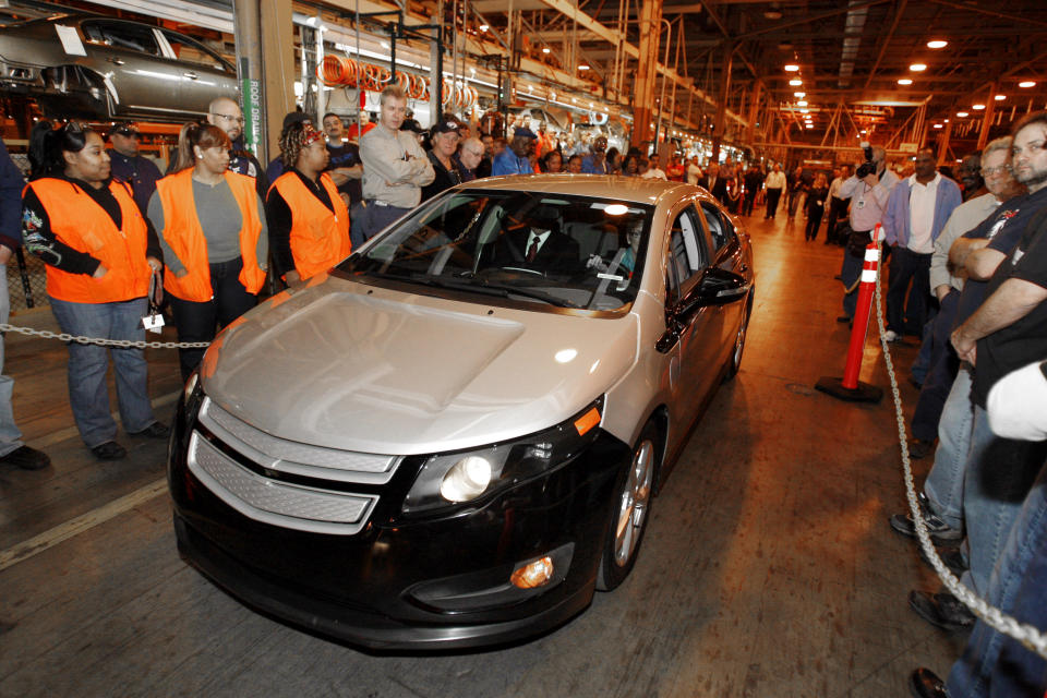 COORECTS DATE OF LAST VOLT TO FEB 19, NOT FEB 26 - FILE - In this Dec. 7, 2009 file photo, a pre-production Chevrolet Volt is driven at the General Motors Hamtramck Assembly plant during a news conference in Hamtramck, Mich. General Motors has stopped making the Chevrolet Volt, a ground-breaking electric car with a gasoline backup motor. The last Volt rolled off the assembly line at a Detroit factory with little ceremony on Tuesday, Feb. 19, 2019. (AP Photo/Carlos Osorio, File)