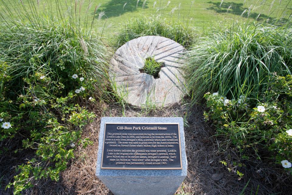 Gristmill stone at Gill-Bass Park in Milton on Thursday, July 20, 2023. The stone was uncovered during the reconstruction of the Locklin Lake Dam in 2008.