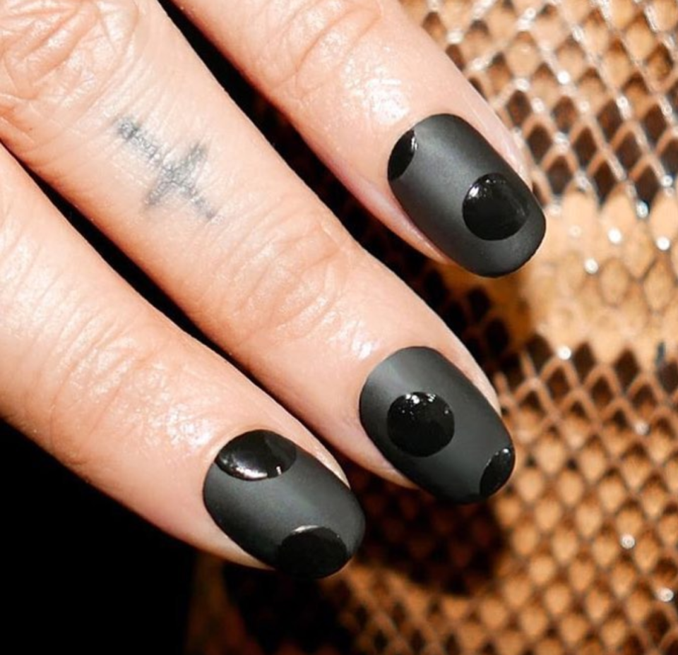 Glossy or matte, the dark can be spooky. Try <a href="https://shop-links.co/1719504990978064723" rel="nofollow noopener" target="_blank" data-ylk="slk:Sally Hansen Miracle Gel in Onyx-pected;elm:context_link;itc:0;sec:content-canvas" class="link ">Sally Hansen Miracle Gel in Onyx-pected</a> layered with the <a href="https://shop-links.co/1719504940928716559" rel="nofollow noopener" target="_blank" data-ylk="slk:Miracle Gel Matte Topcoat;elm:context_link;itc:0;sec:content-canvas" class="link ">Miracle Gel Matte Topcoat</a>.