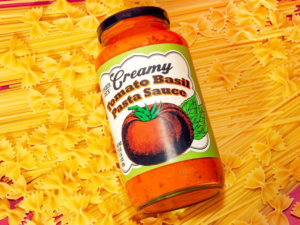 Trader Joe's creamy tomato-basil sauce on a pile of spaghetti and bowtie noodles