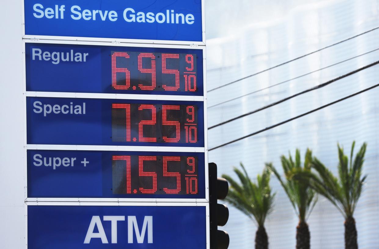 High gas prices are displayed at a Mobil station across the street from the Beverly Center on March 7, 2022 in Los Angeles, California.